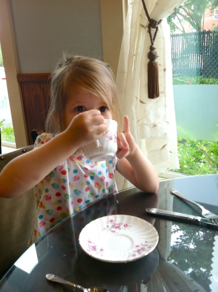 I told them about drinking with their pinky up, so this is how Tay does it.