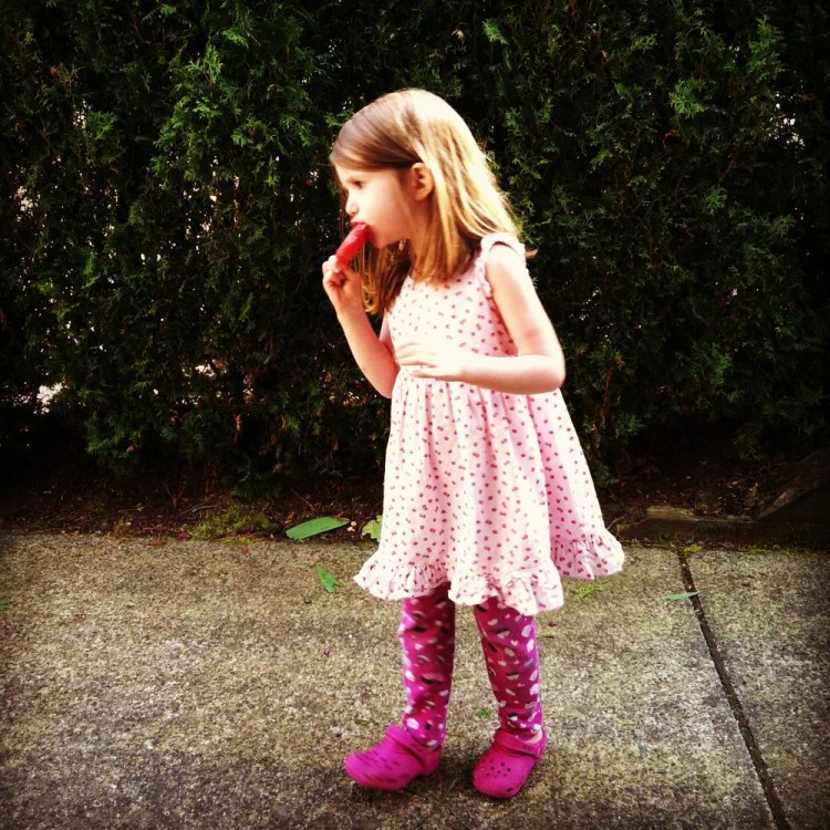 We celebrated on one of our sunny days with popsicles. &nbsp;I love her style and the shoes on the wrong feet. &nbsp;