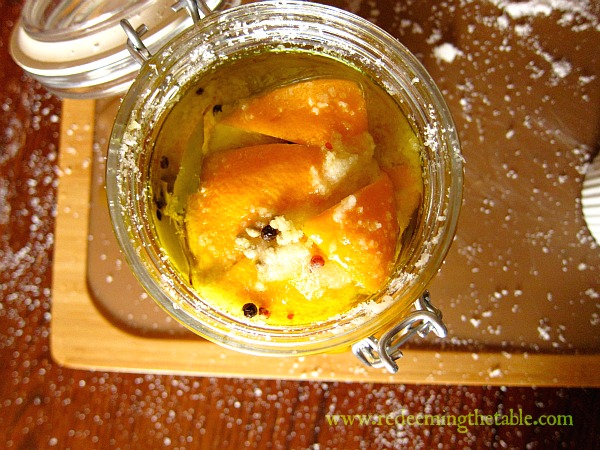 Until it looks like this. &nbsp;The olive oil should cover the tops. Seal it and store it away in a cool, dark cupboard. &nbsp;Shake every day or so. Store for one month before using.&nbsp;