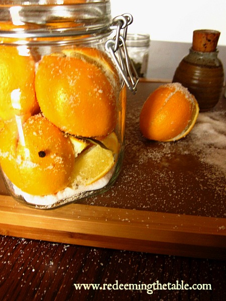 Fill the bottom of your jar about 1/2 inch of salt. &nbsp;Pack in the generously salted lemons, try and close them up to keep the salt inside. &nbsp;Then cram them in to keep them close together.