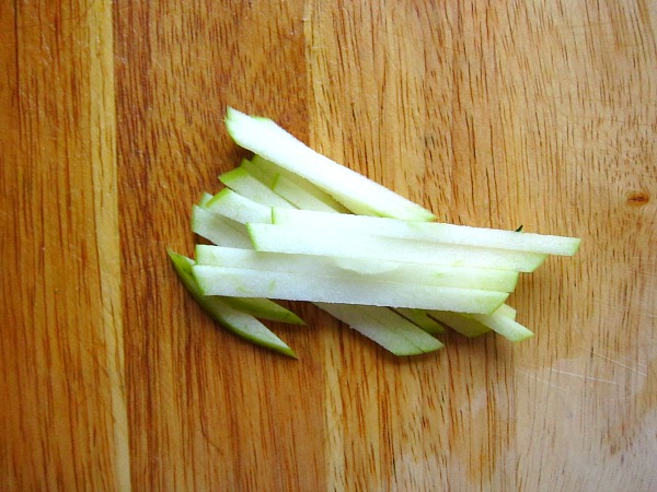 &nbsp; &nbsp; &nbsp; &nbsp; Take two of the apple slices and put them on top of one another and cut them into Batons, which is what you see. &nbsp;These are 1/4 inch
