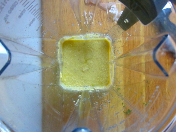 &nbsp;Add the lemon juice, olive oil, garlic cloves, salt, aCV into a high powered blender and blend to emulsify. &nbsp;Then&nbsp;after 10 seconds or so, add the cashews and jalapeno and blend more. &nbsp;It should look like this.